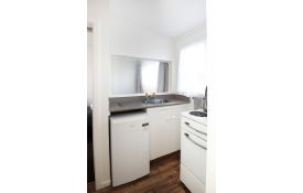 accommodation for one person with full kitchen facilities