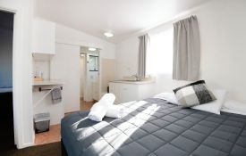 1-bedroom unit can sleep up to three guests